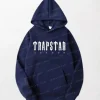 Navy Blue Trapstar Hoodie - Traps Text in White, Drawstring Hood, Kangaroo Pocket, Ribbed Cuff and Hem.