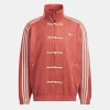 Pink suede Adidas track jacket with Trefoil logo and ribbed cuffs