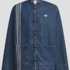Adidas Lunar Heritage Denim Jacket featuring a vintage wash and sporty streetwear design.