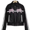 Diddi Moda Pink Bow Faux Leather Jacket with a chic bow detail and vibrant pink color.