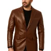 Men’s tan leather shirt jacket with western yoke, snap buttons, and slim-fit silhouette.