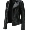 Women’s black asymmetrical leather biker jacket with diagonal zip and fitted silhouette.